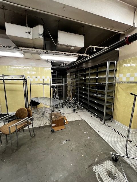 Junk B Gone crew removing items from YWCA basement