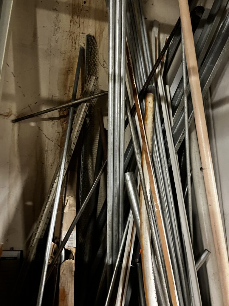 Scrap metal pipes in a Seattle basement ready for recycling