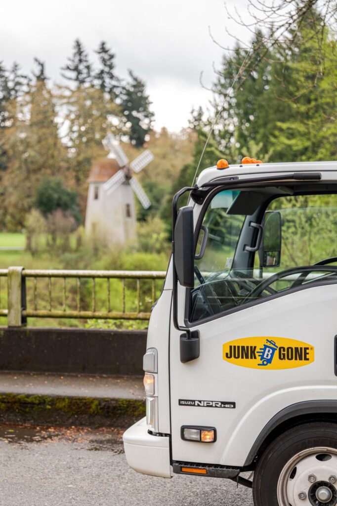 Junk B Gone truck near the Marymoor Park windmill in Redmond, WA — Redmond junk removal