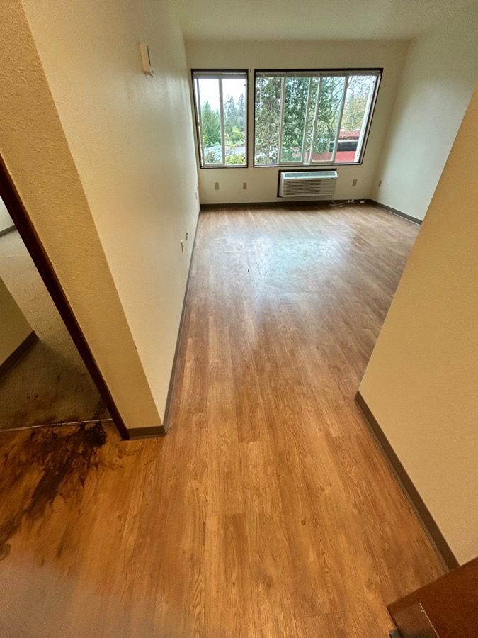 Apartment unit hallway cleared clean by Junk B Gone at Elbert House Apartments, Bellevue