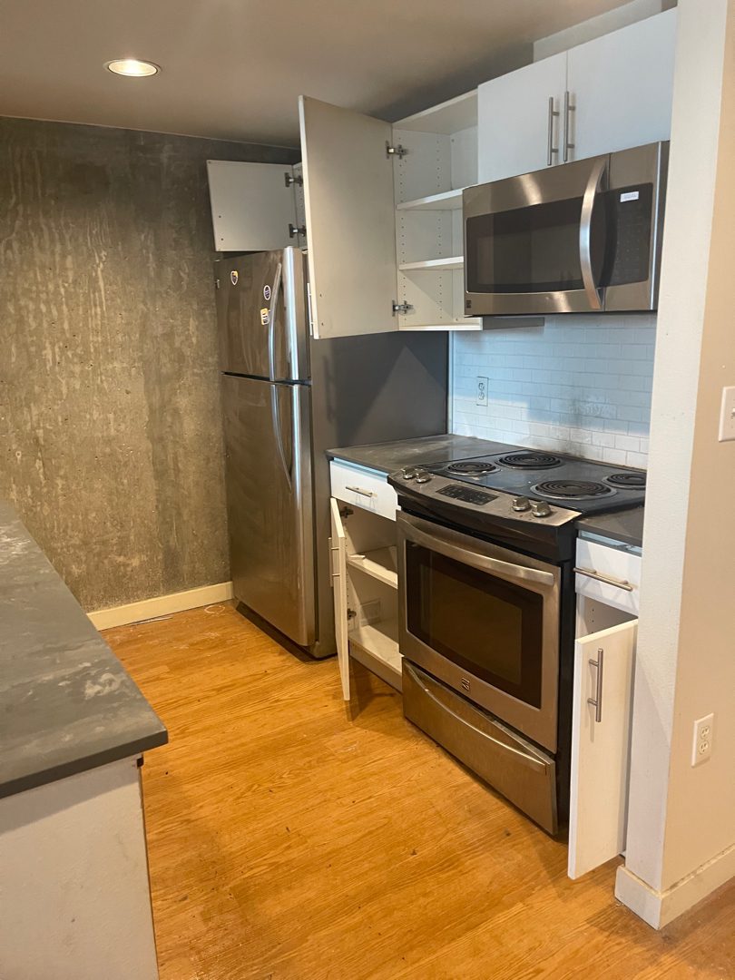 A cleared residential kitchen left clean and welcoming after a Junk B Gone cleanout in Seattle