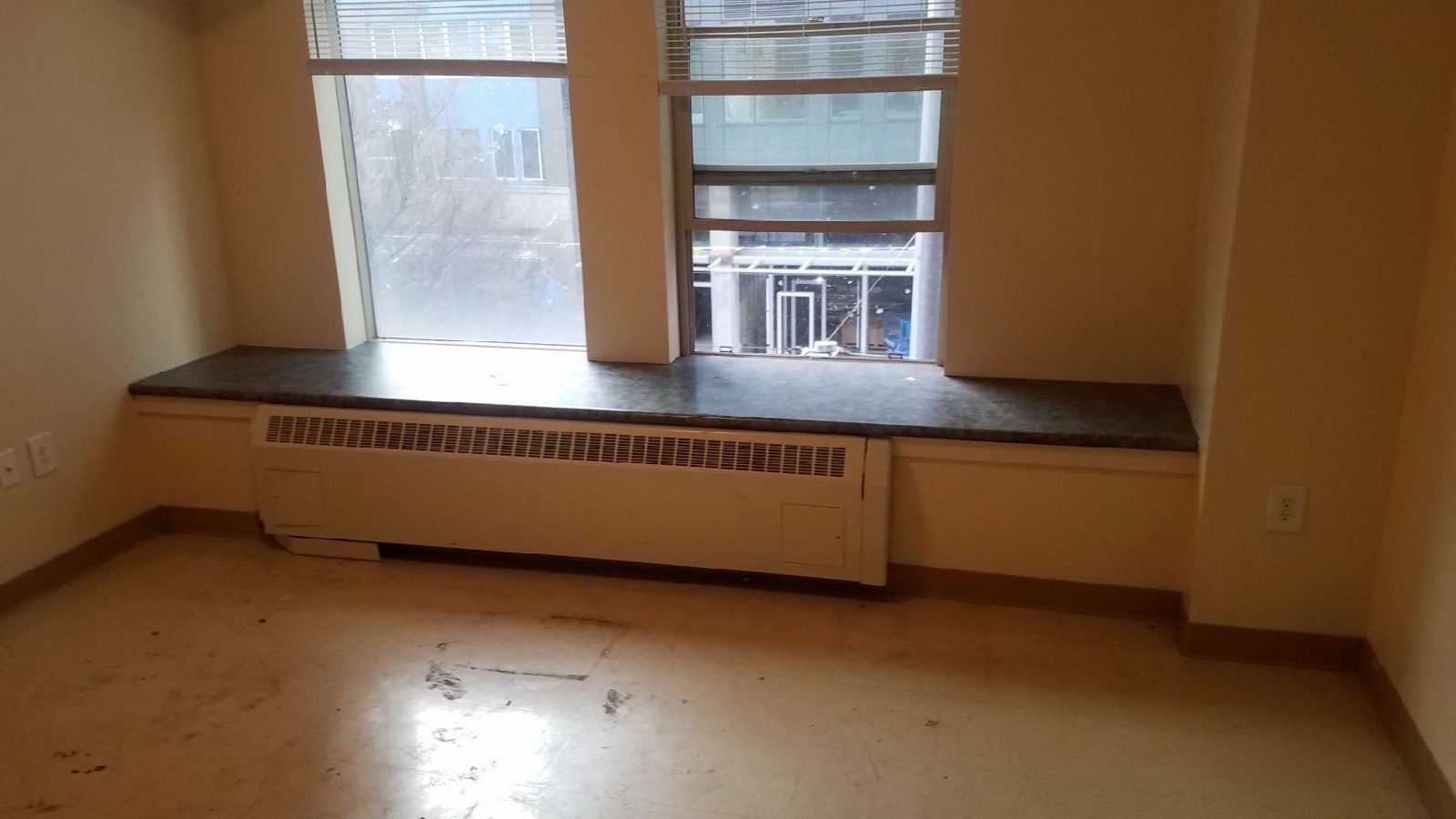 Same bedroom emptied and broom-ready after Junk B Gone