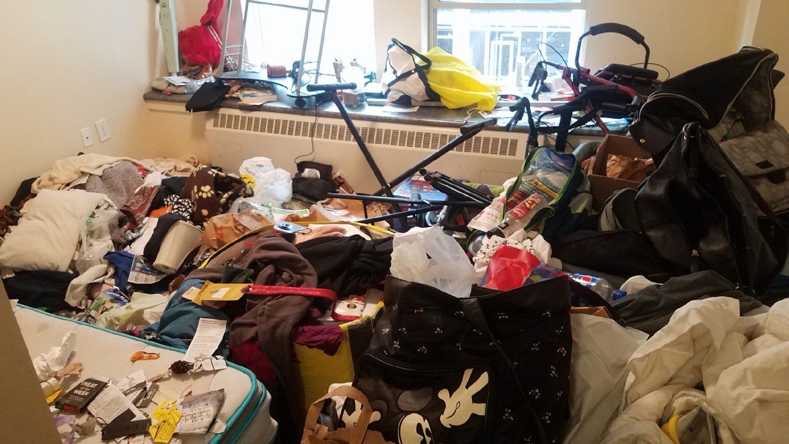 Seattle bedroom full of furniture and clutter before junk removal