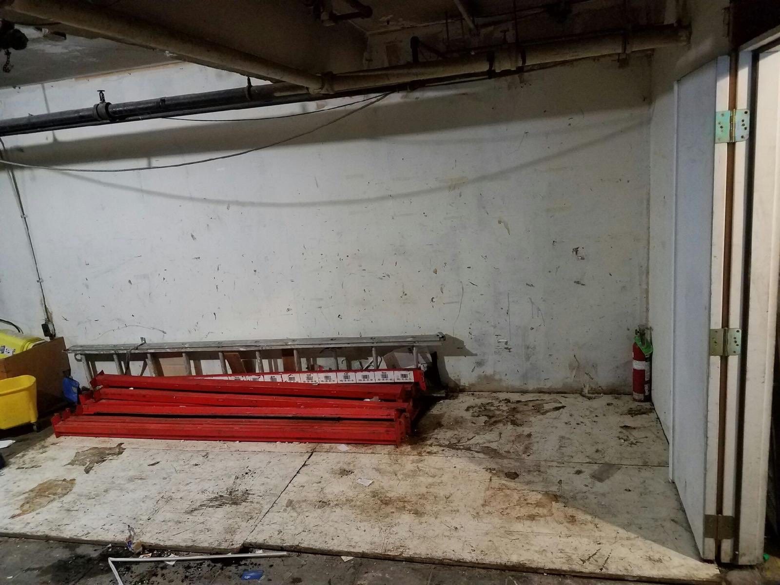 Same Seattle garage cleared to the slab after Junk B Gone