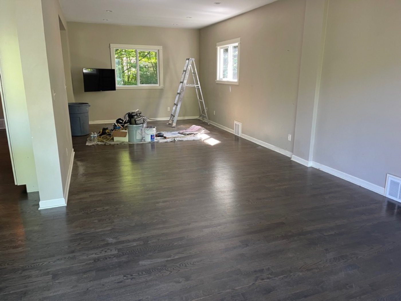 Cleared great room in Seattle - Junk B Gone emptied a great room to dark hardwood floors, ready for showings