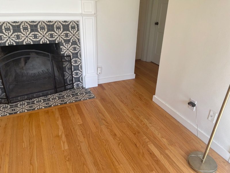 Living room cleanout in Seattle - Junk B Gone cleared a living room with fireplace during a downsizing job