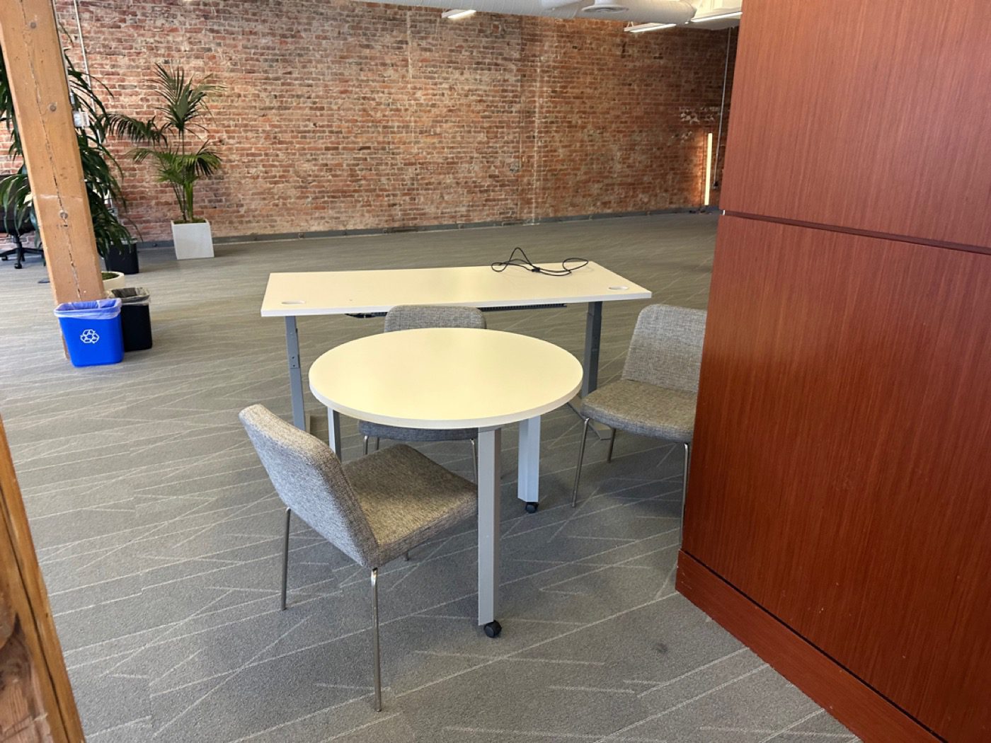 Brick-wall Seattle office space after office furniture removal by Junk B Gone