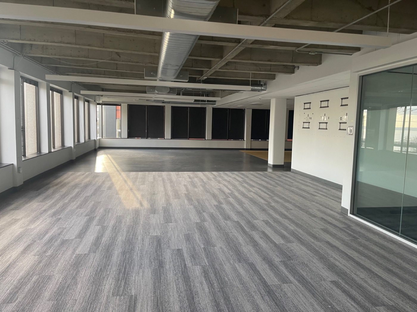 Cleared open office loft with exposed ceiling after Junk B Gone office furniture removal