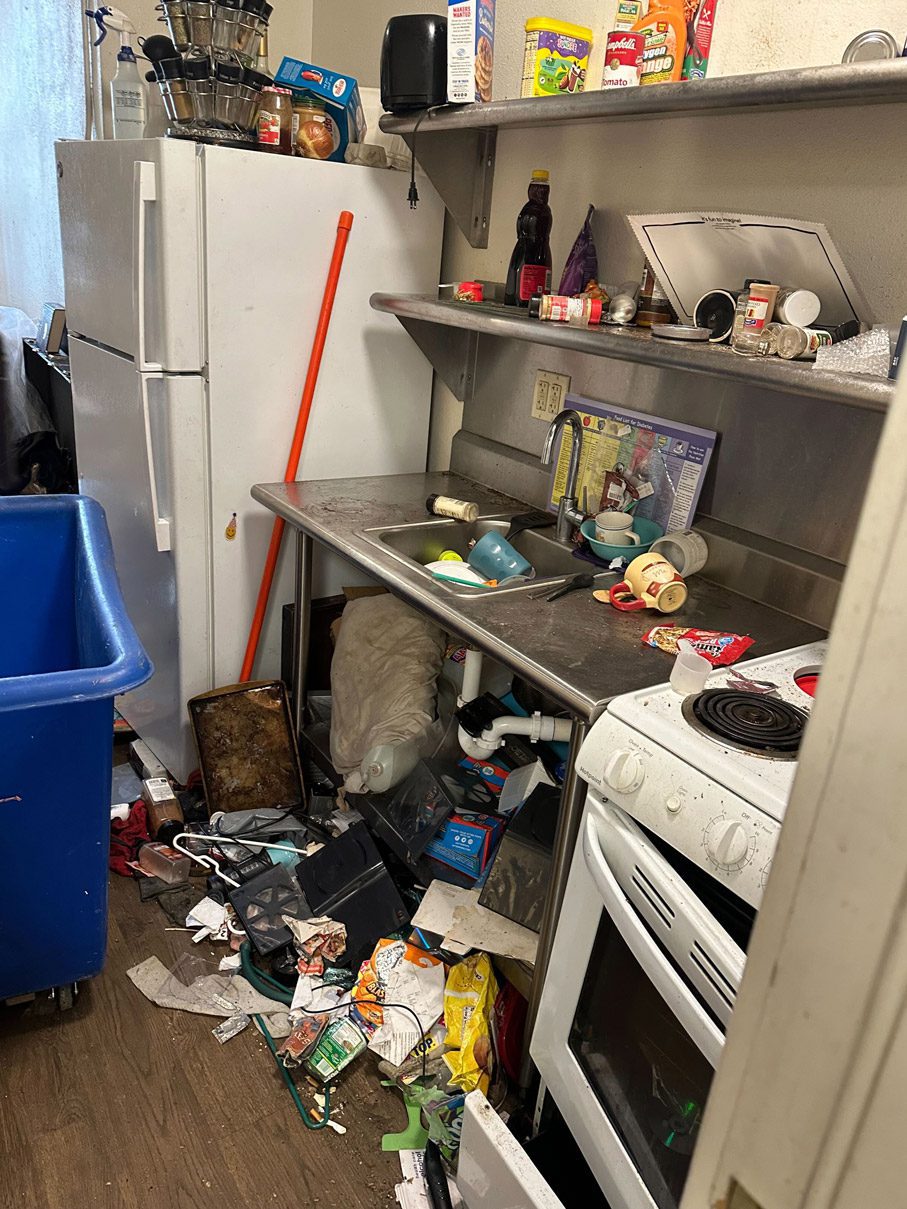 Apartment full of junk before cleanout