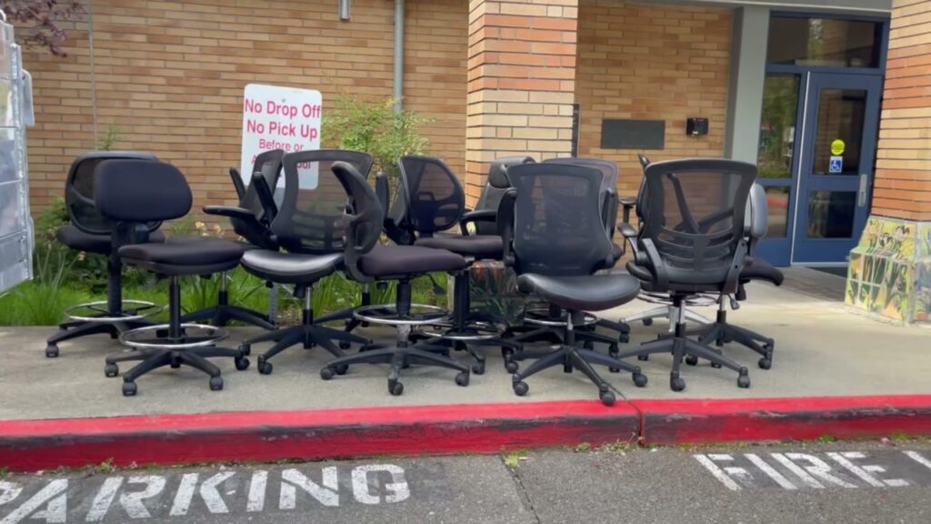 Office chairs lined up at West Mercer Elementary School after Junk B Gone donation