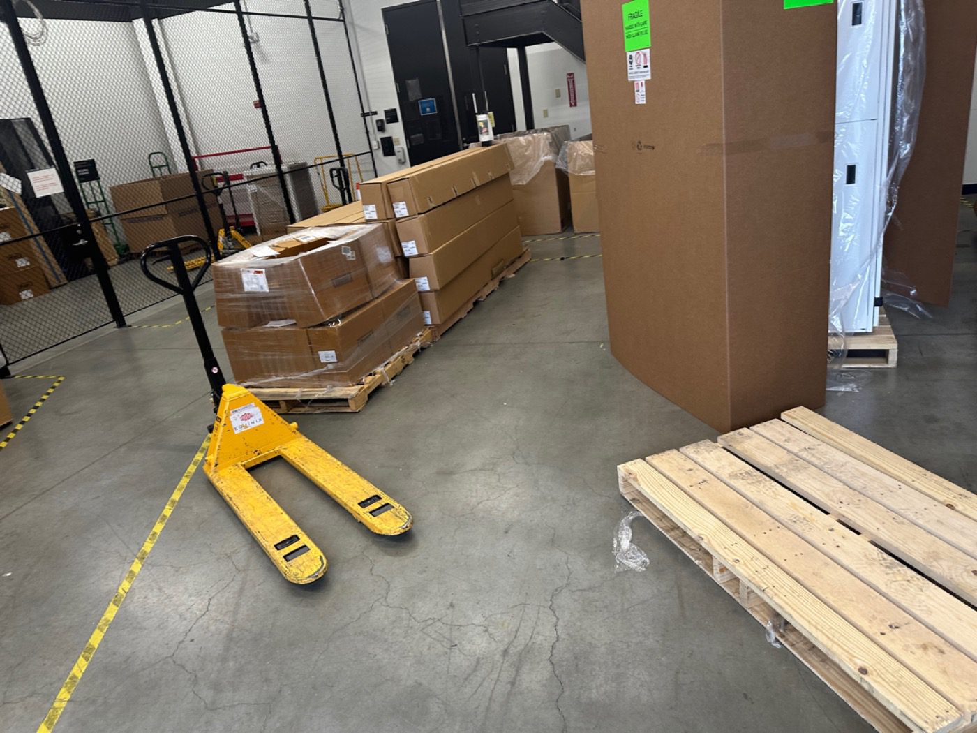 Seattle warehouse with industrial equipment and materials staged for removal
