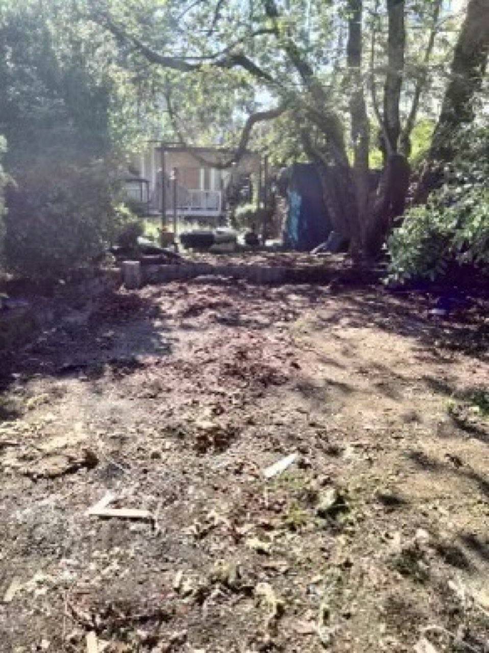 Cleared backyard with the RV completely gone after Junk B Gone removal
