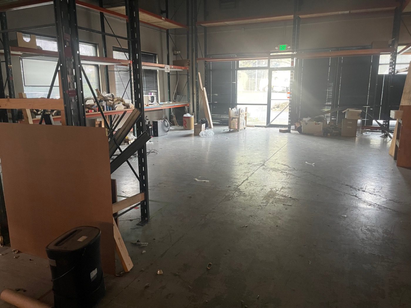 Seattle warehouse cleared to bare concrete after a Junk B Gone commercial cleanout