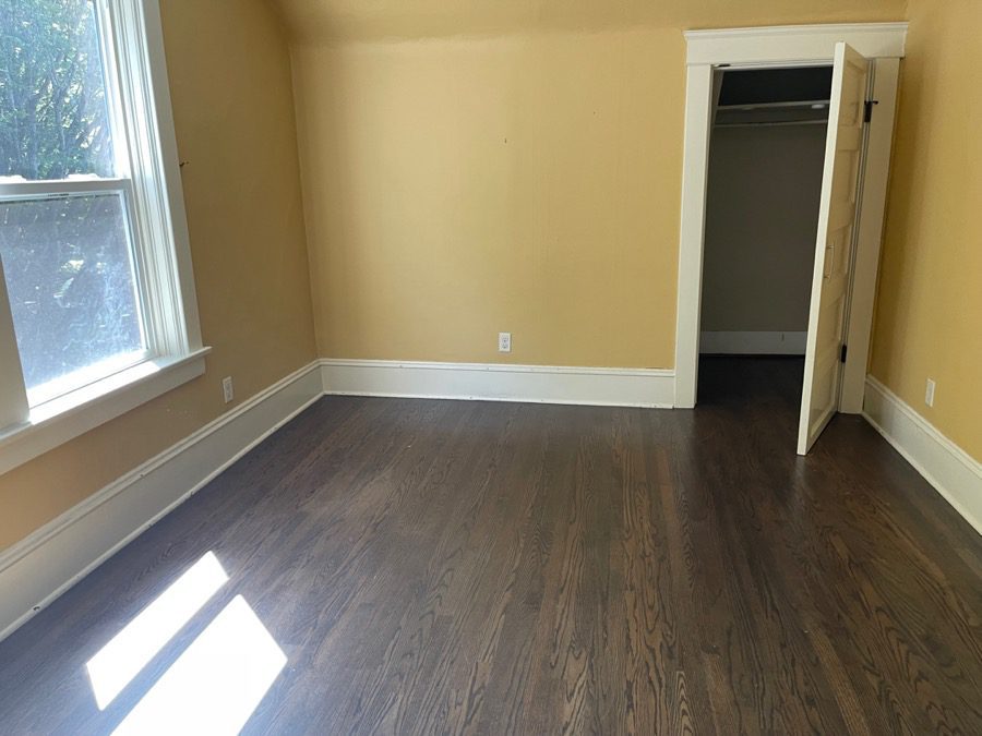 Bedroom cleanout in Seattle - Junk B Gone fully cleared and broom-swept a residential bedroom