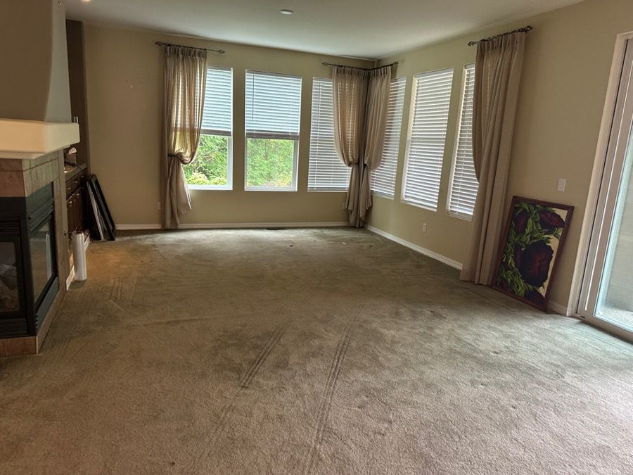 Living room cleanout in Redmond - Junk B Gone cleared a bright living room show-ready after junk removal