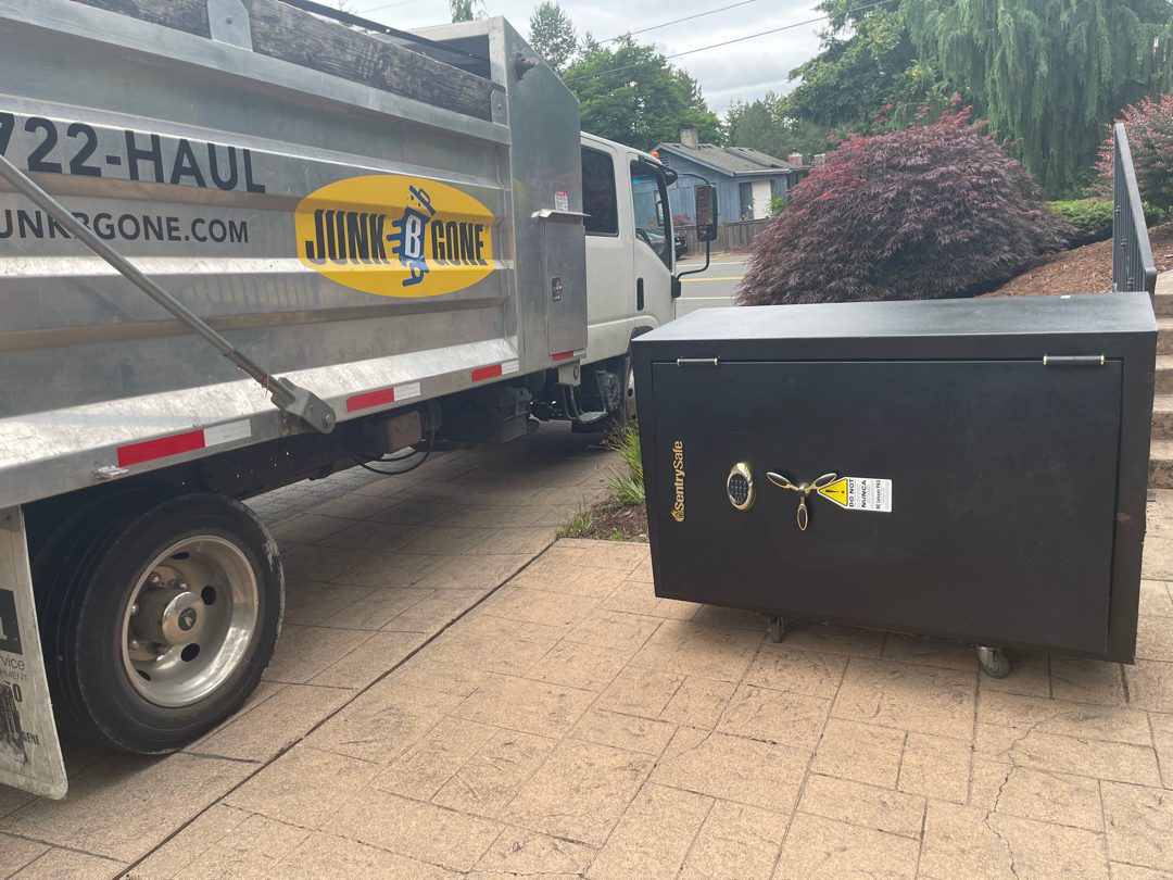 Junk B Gone branded hauling truck on a Kirkland safe removal